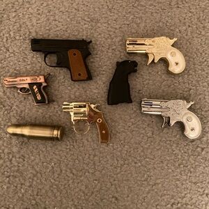 7 replicated gun lighters